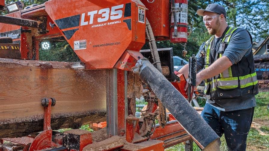 Wood-Mizer operator sawing timber with an LT35 portable mill